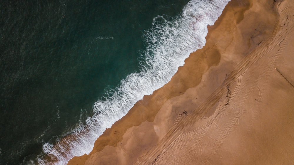 a bird's eye view of a beach and ocean