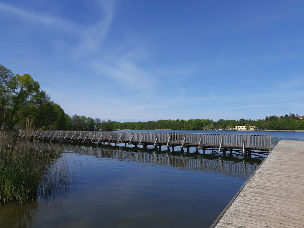 a long wooden bridge over a body of water