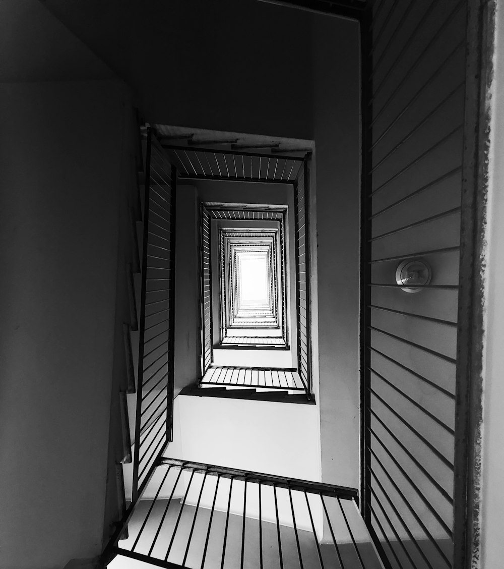 a black and white photo of a window in a building