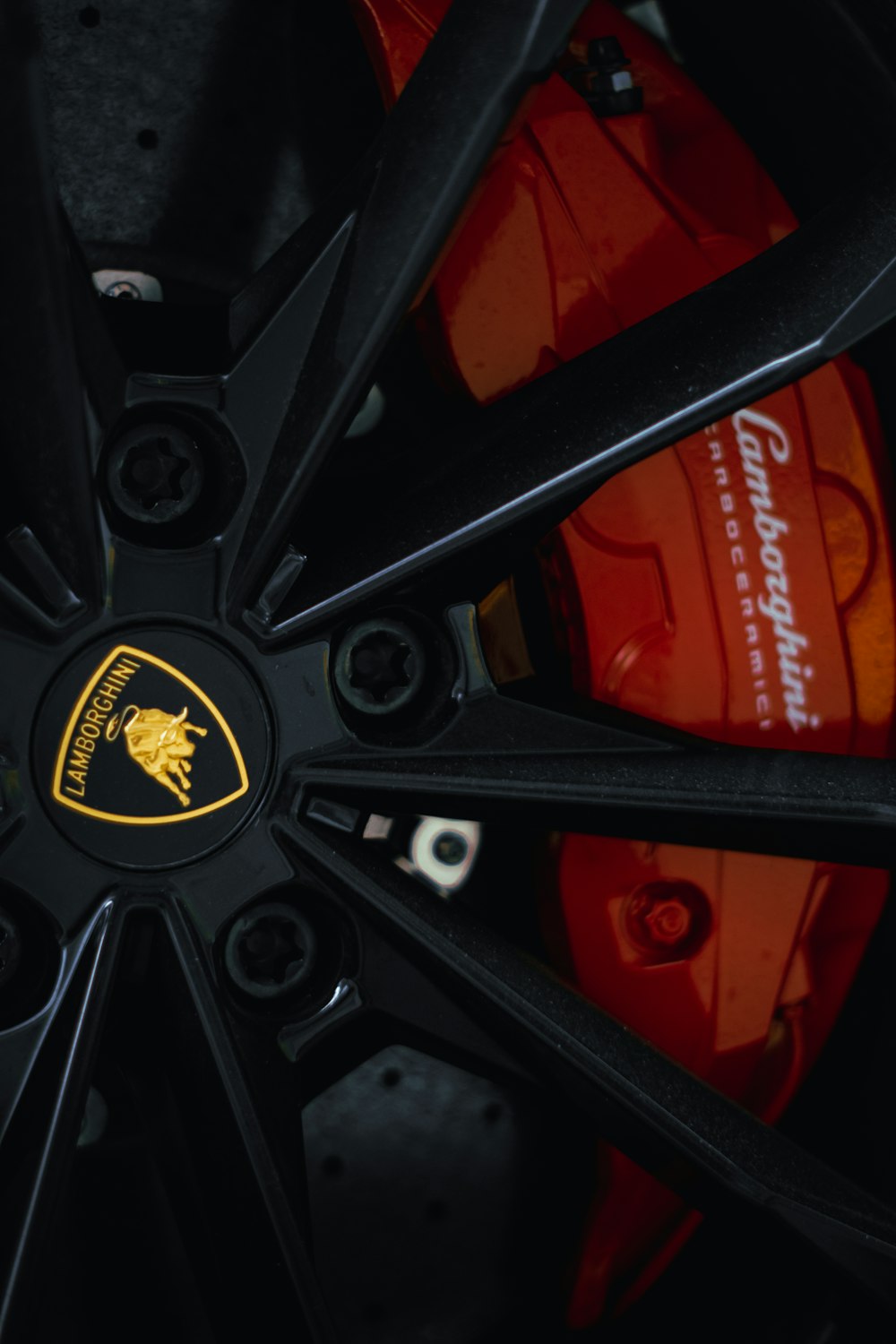 a close up of a wheel on a sports car