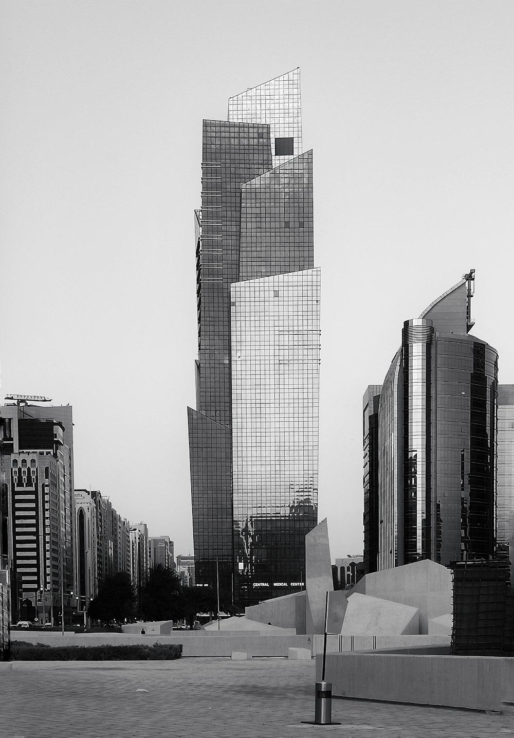 a black and white photo of a city with skyscrapers