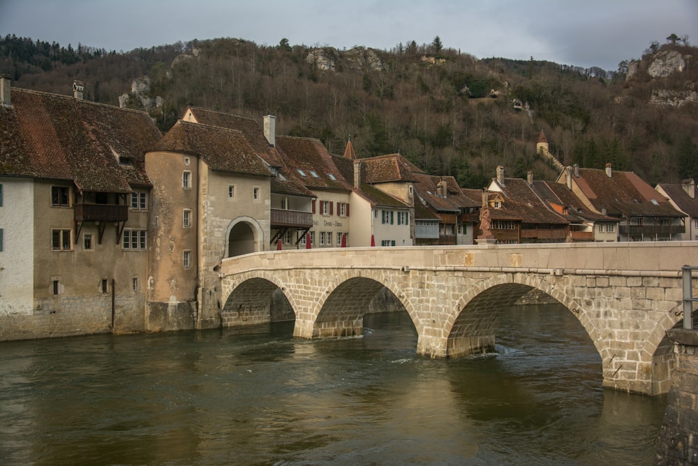 a bridge over a body of water in a town