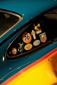 a close up of a car with stickers on it