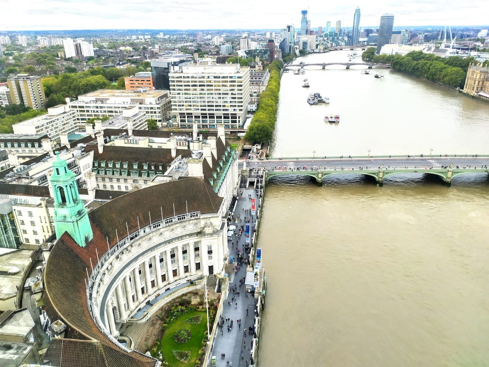 an aerial view of a river and a bridge