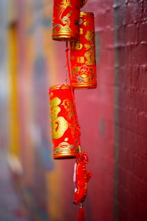 A vibrant red and gold horse silhouette bursting with fireworks, symbolizing luck and celebration for Chinese New Year 2026.