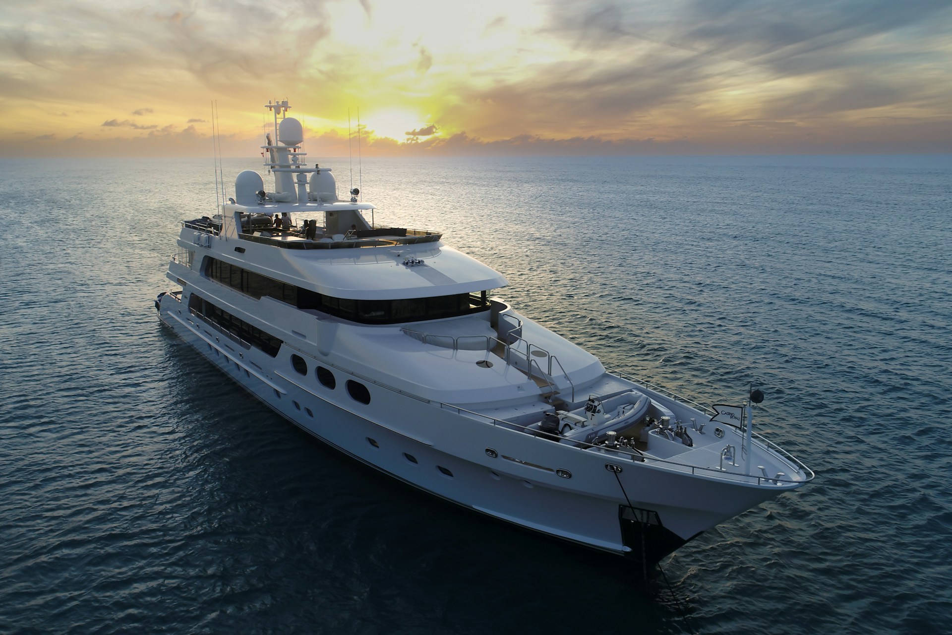 a large white boat in the middle of the ocean