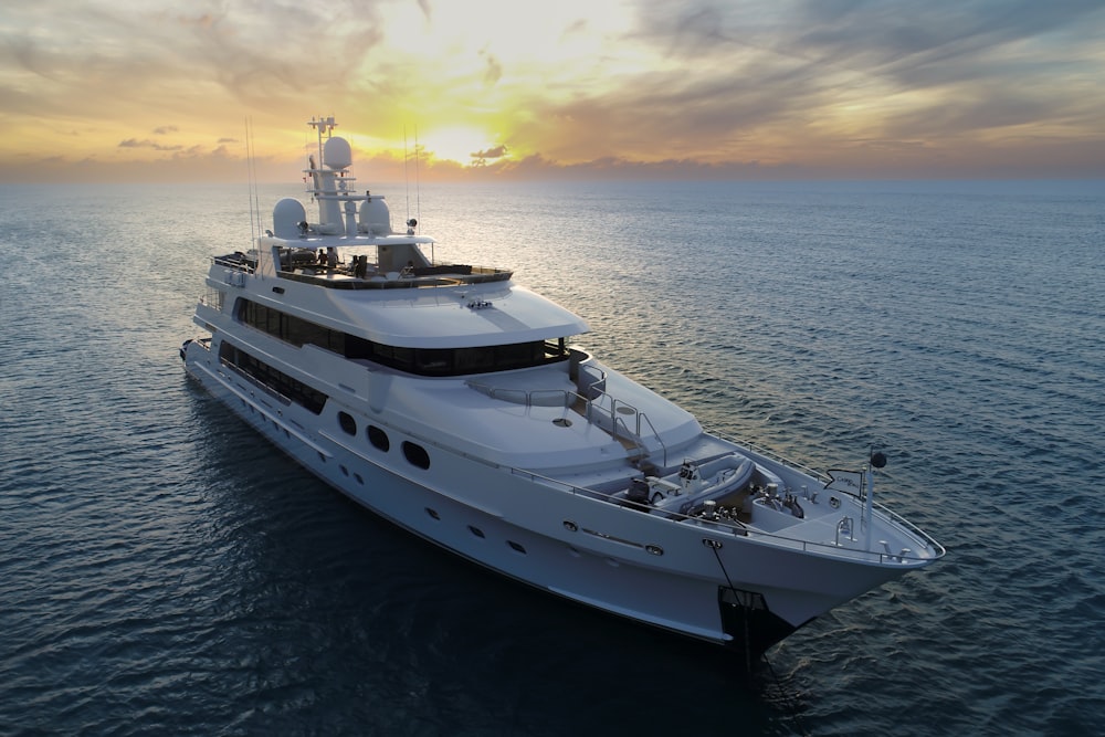 a large white boat in the middle of the ocean