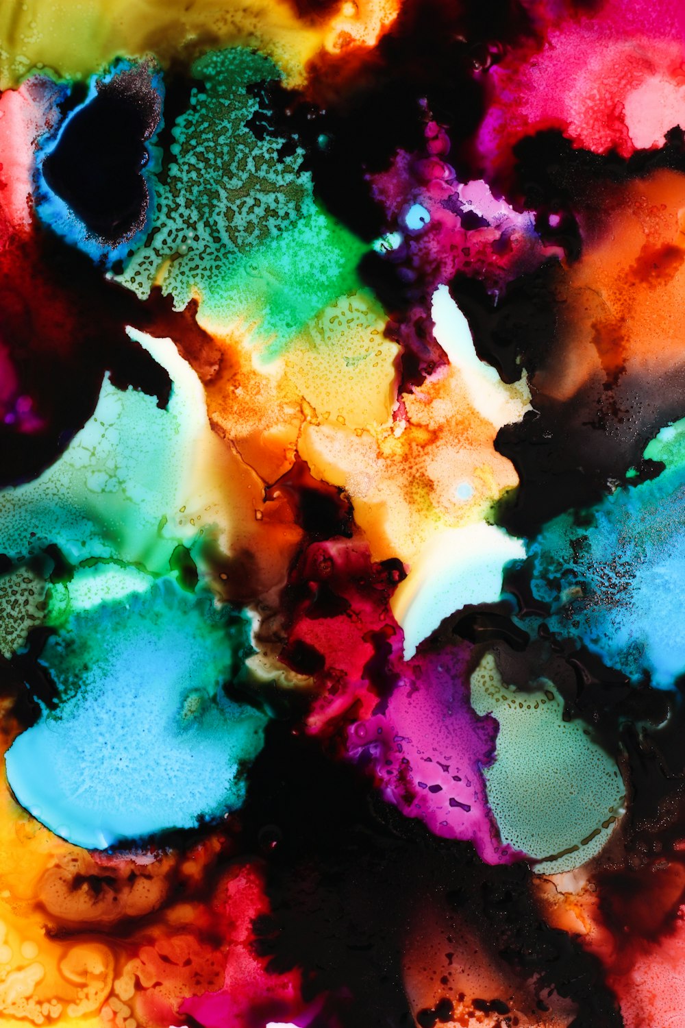 a close up of a multi colored substance