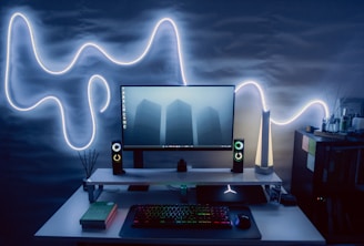 A sleek modern computer setup glowing against a digital world map backdrop.