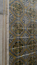 Close-up of elegant Algerian ceramic tiles with intricate patterns.