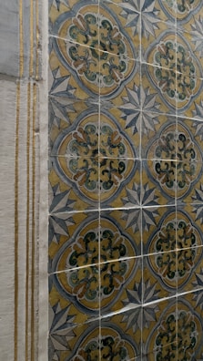 A close-up of a detailed ceramic tile showcasing craftsmanship.