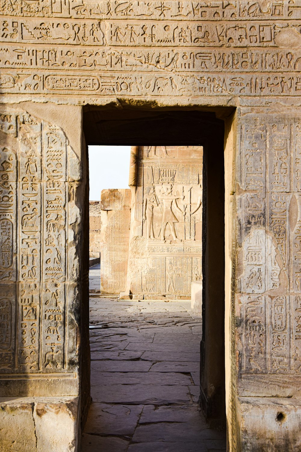 a doorway to a building with writing on it