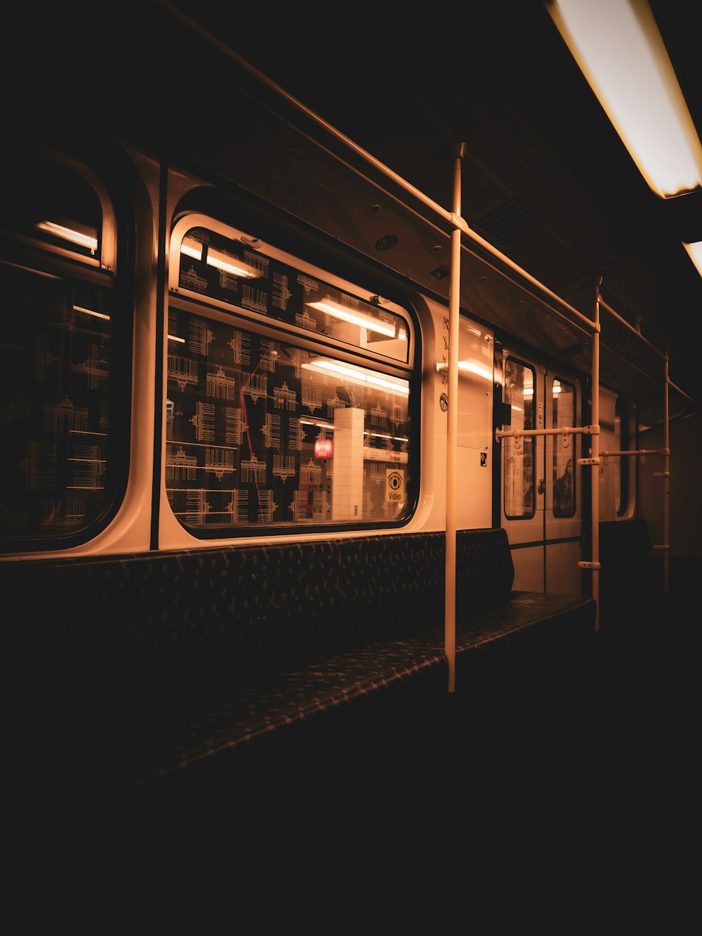 a subway car with the doors open at night