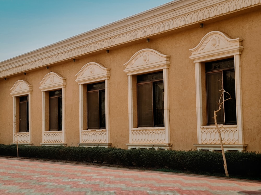 a row of windows sitting on the side of a building