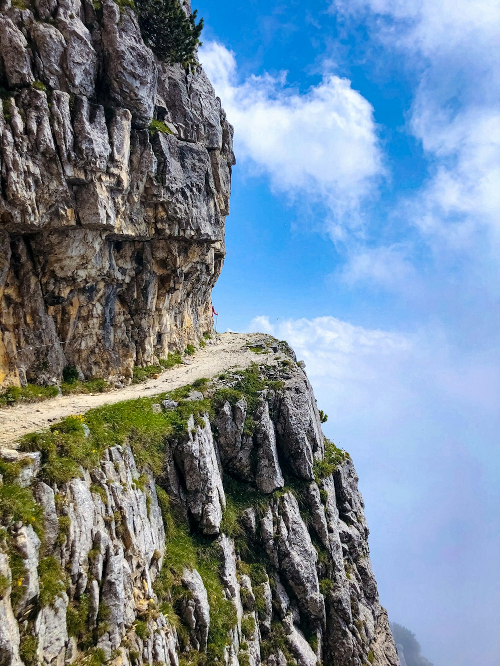 a road going up the side of a mountain