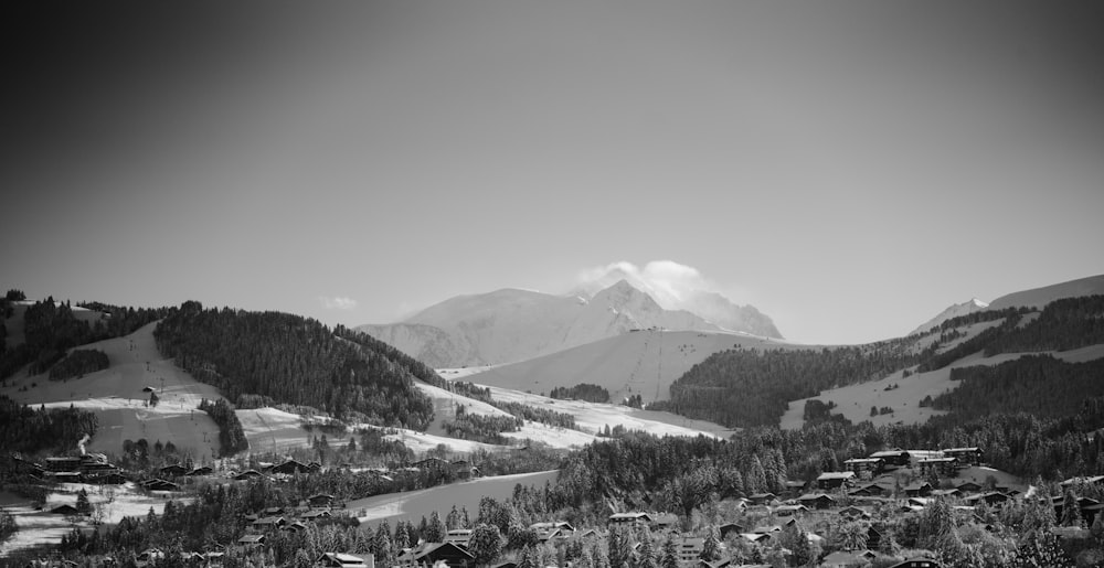 a black and white photo of a ski resort