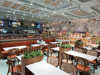 A beautifully designed cafe with cozy seating arrangements.