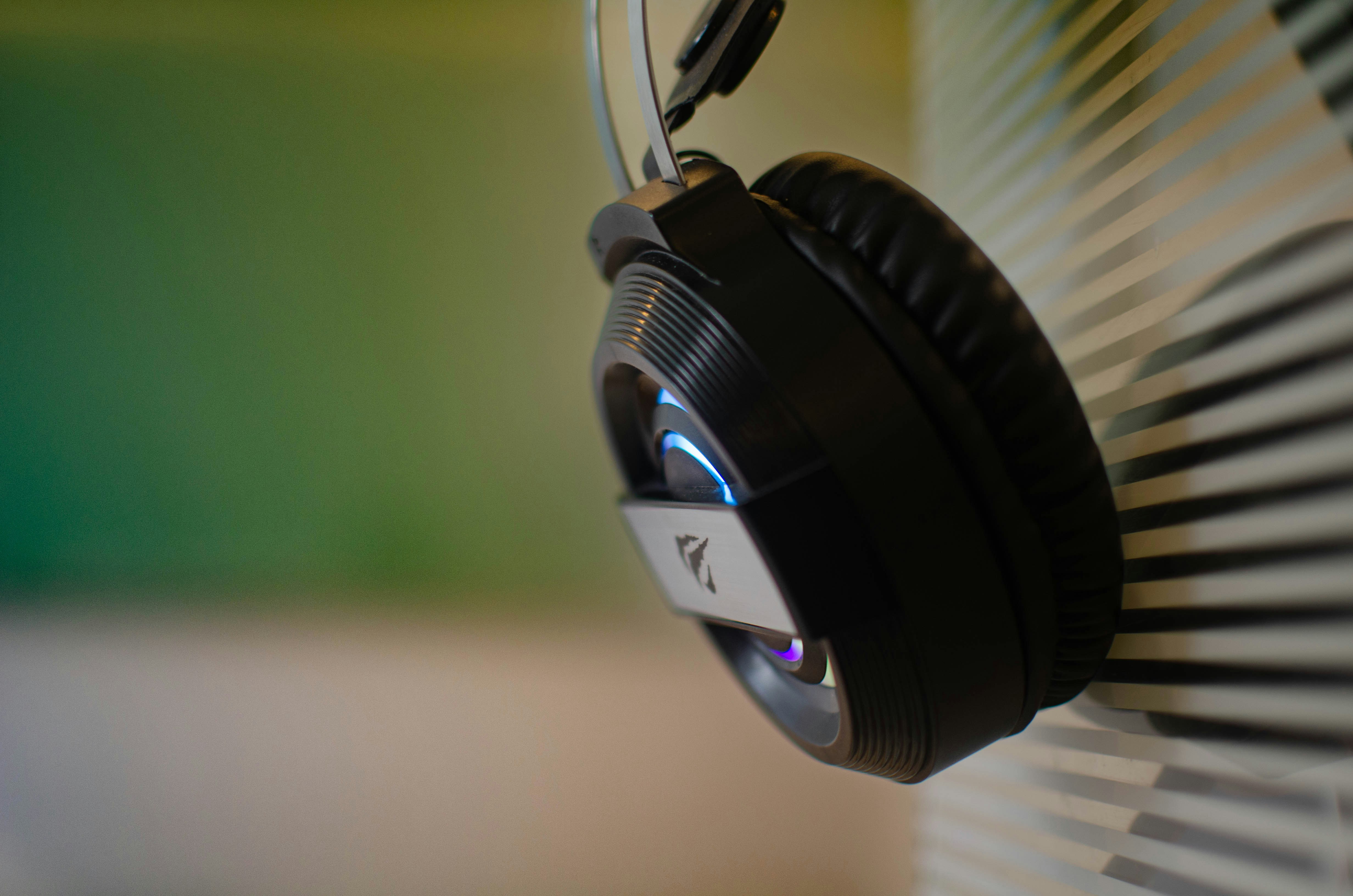 a pair of headphones hanging on a wall