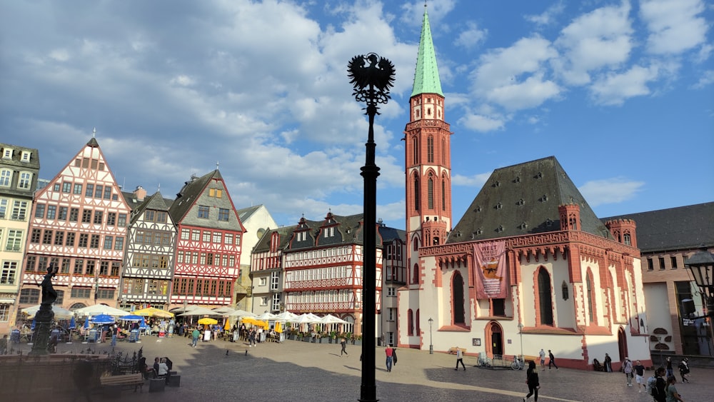 a tall clock tower towering over a city