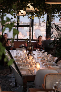 a dining room with a table set for a meal