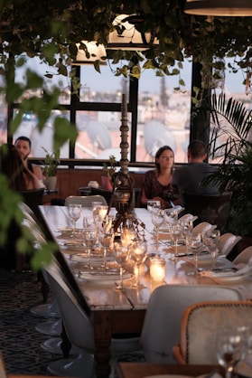 a dining room with a table set for a meal