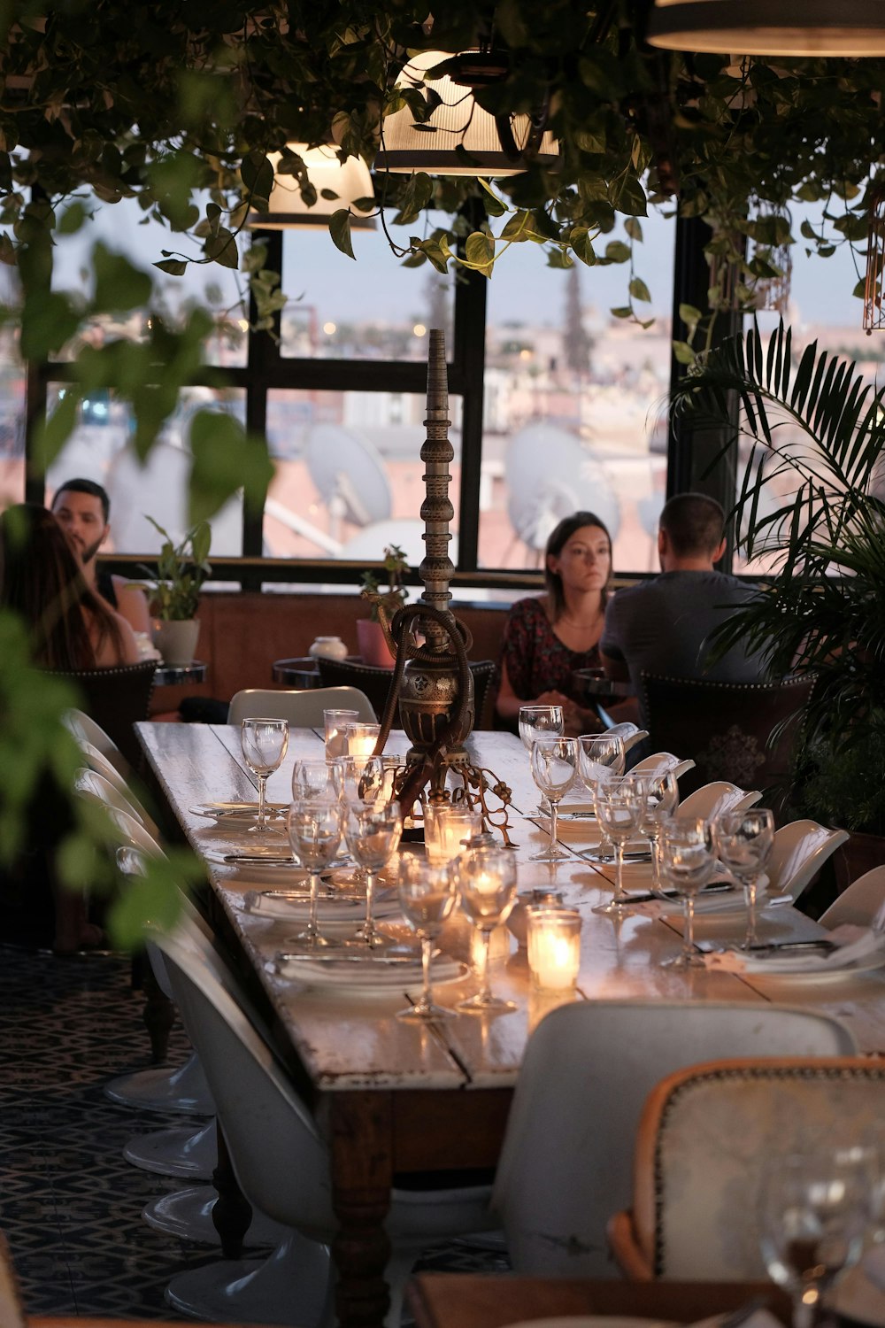 a dining room with a table set for a meal