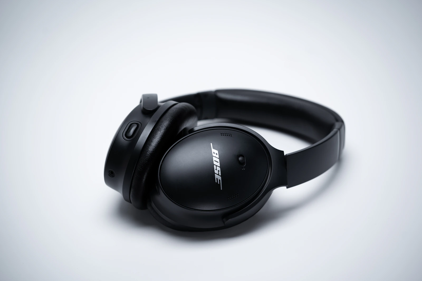 Black Bose QuietComfort headphones on white