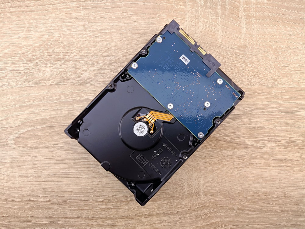 a hard drive being removed from a hard drive