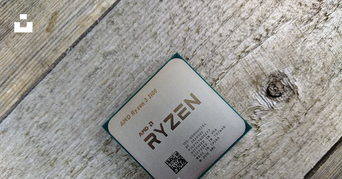 A close up of a cpu on a wooden surface photo – Free Cpu Image on Unsplash