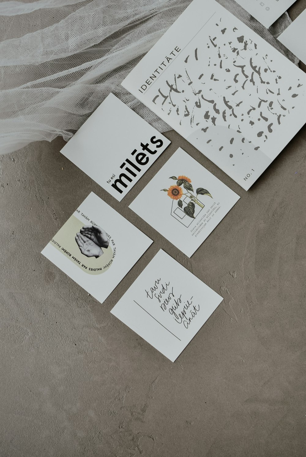 a table topped with lots of cards and envelopes