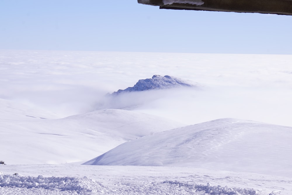 a view of a mountain covered in snow