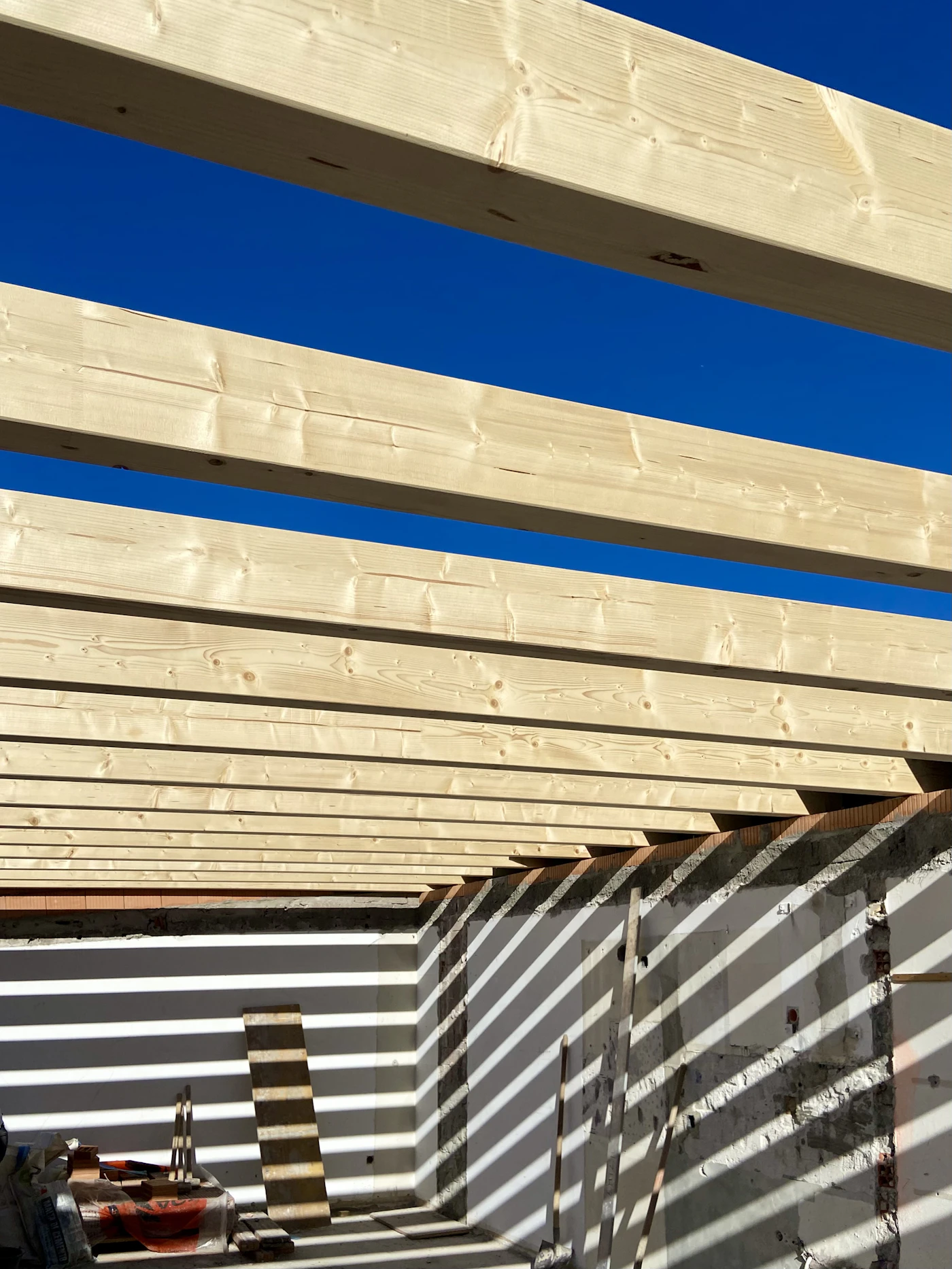 Craftsman working with timber on a remodeling project