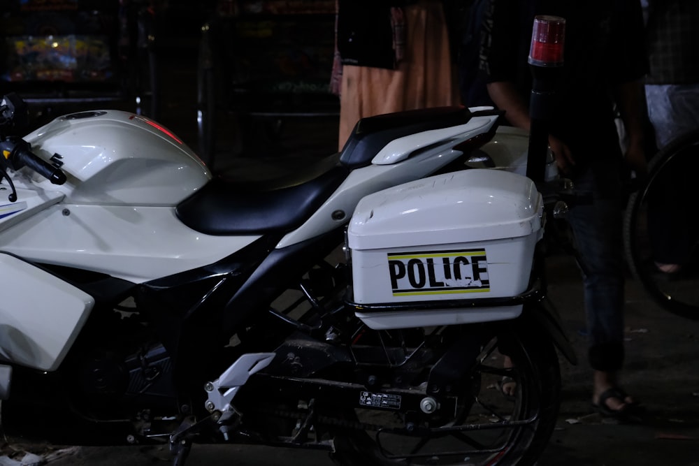 a police motorcycle parked on the side of the road