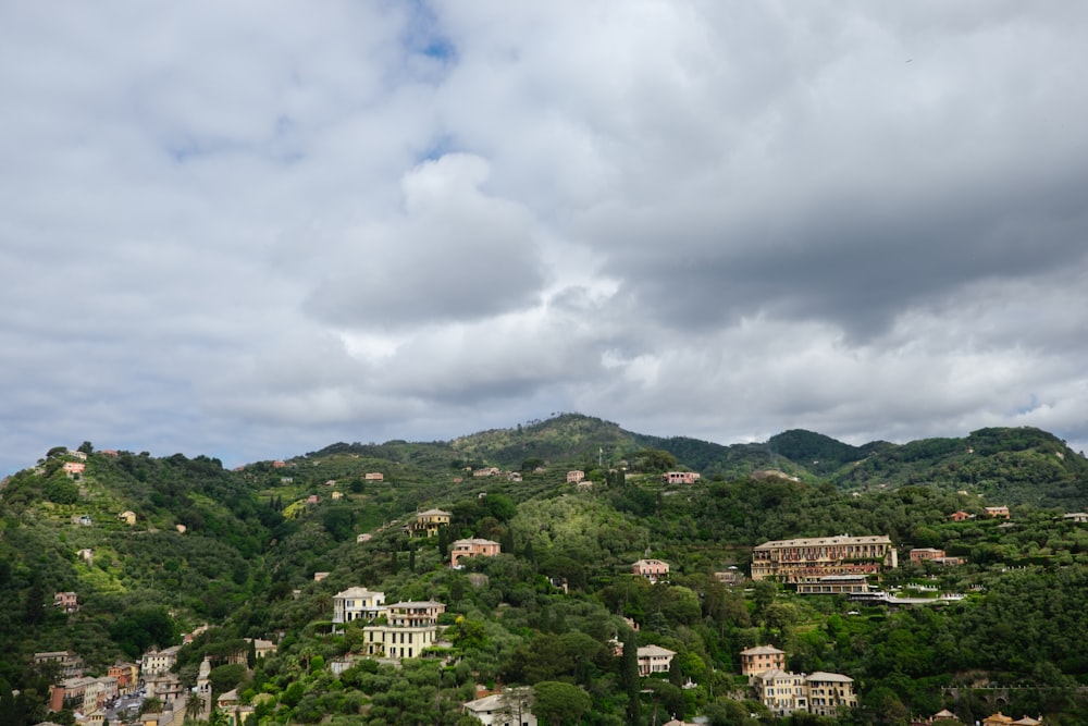 a view of a hillside with houses on it