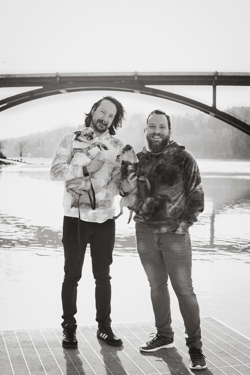 a couple of men standing next to each other