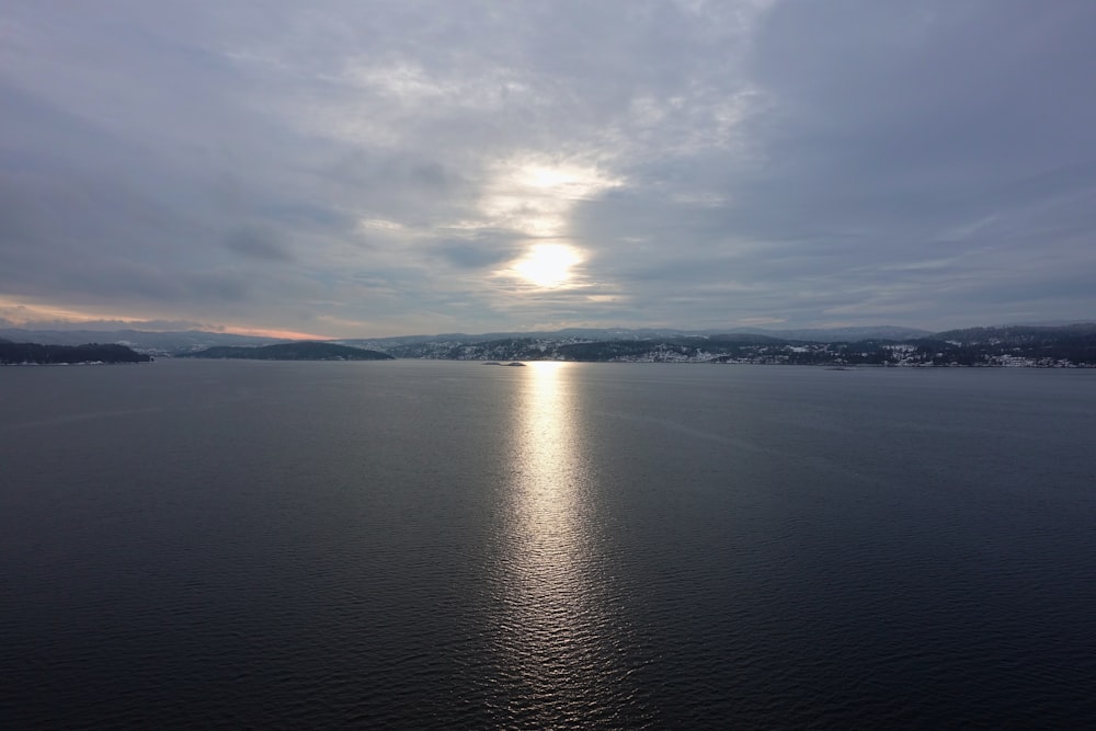 a large body of water surrounded by mountains