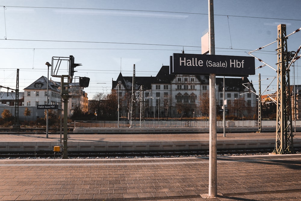 a train station with a train on the tracks