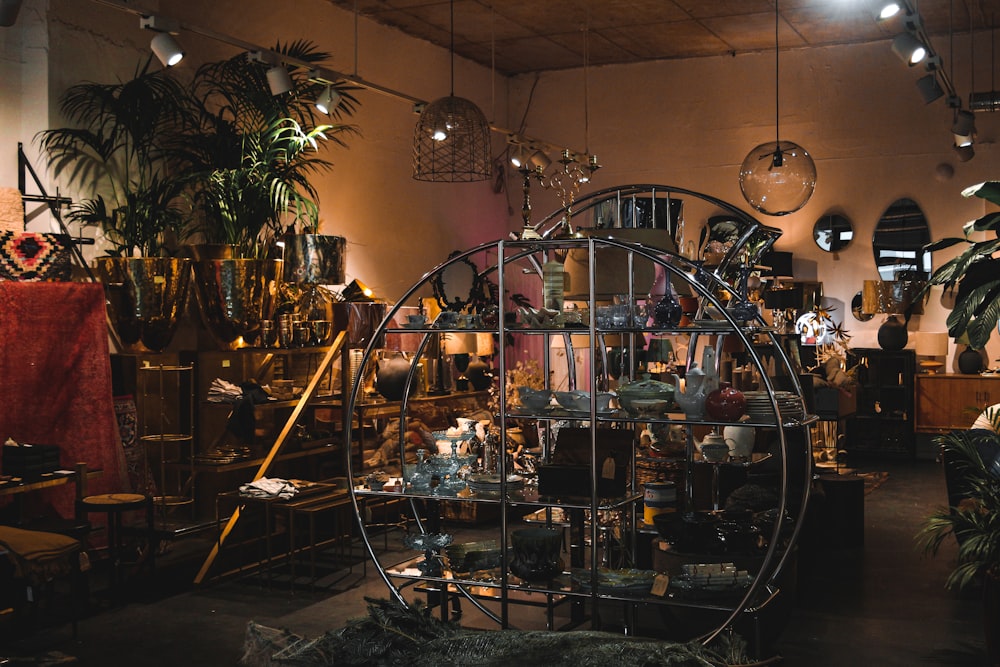 a room filled with lots of furniture and plants