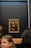 A stunning hyper-realistic painting displayed in a gallery.