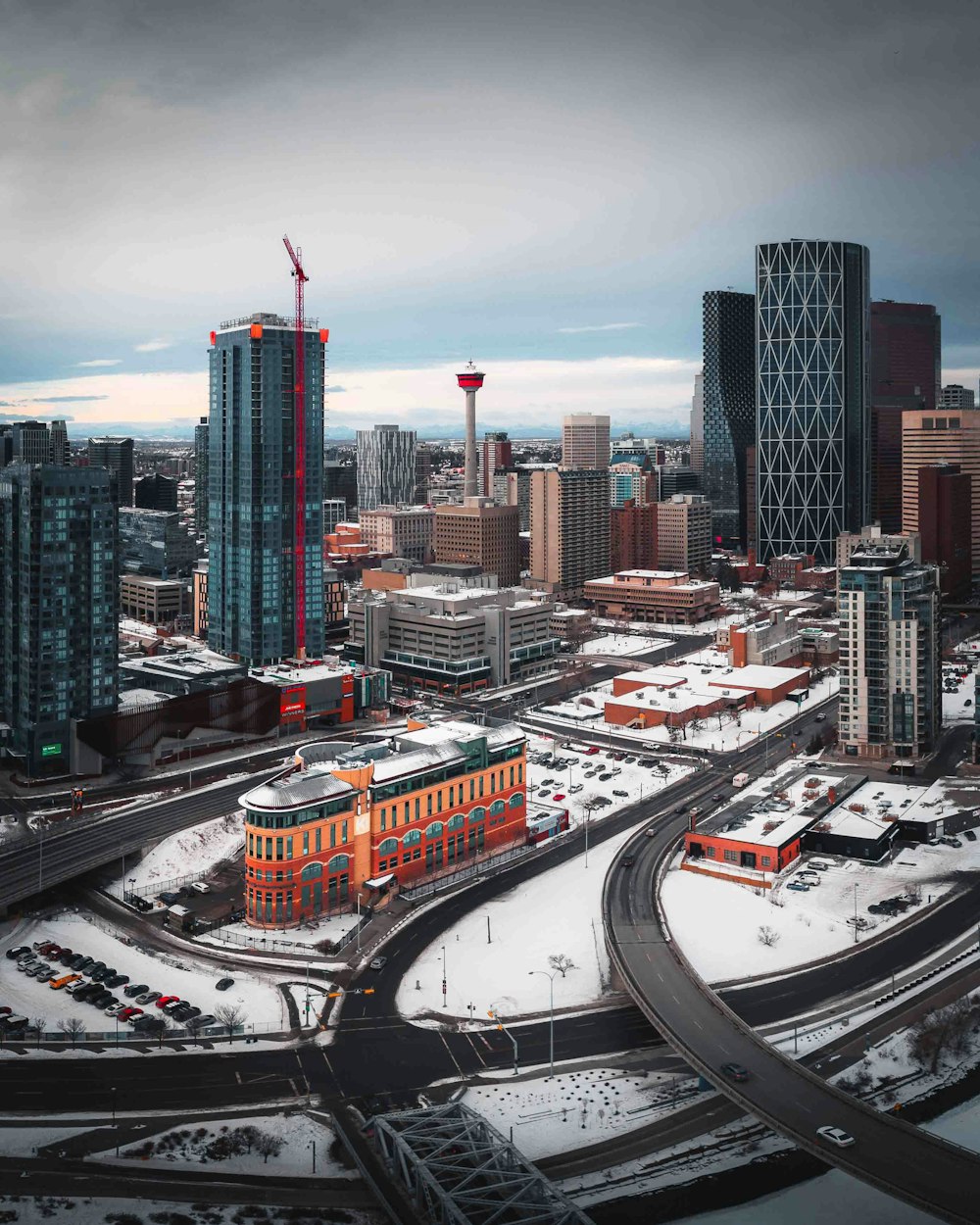 an aerial view of a city in winter