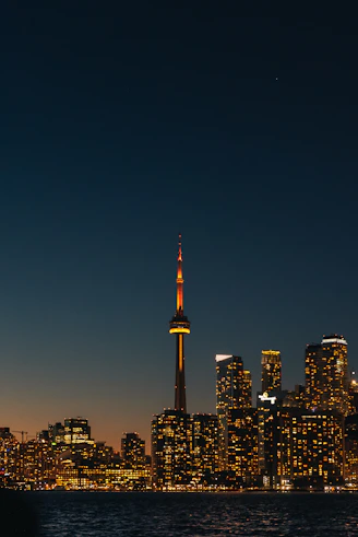 a view of a city at night from across the water