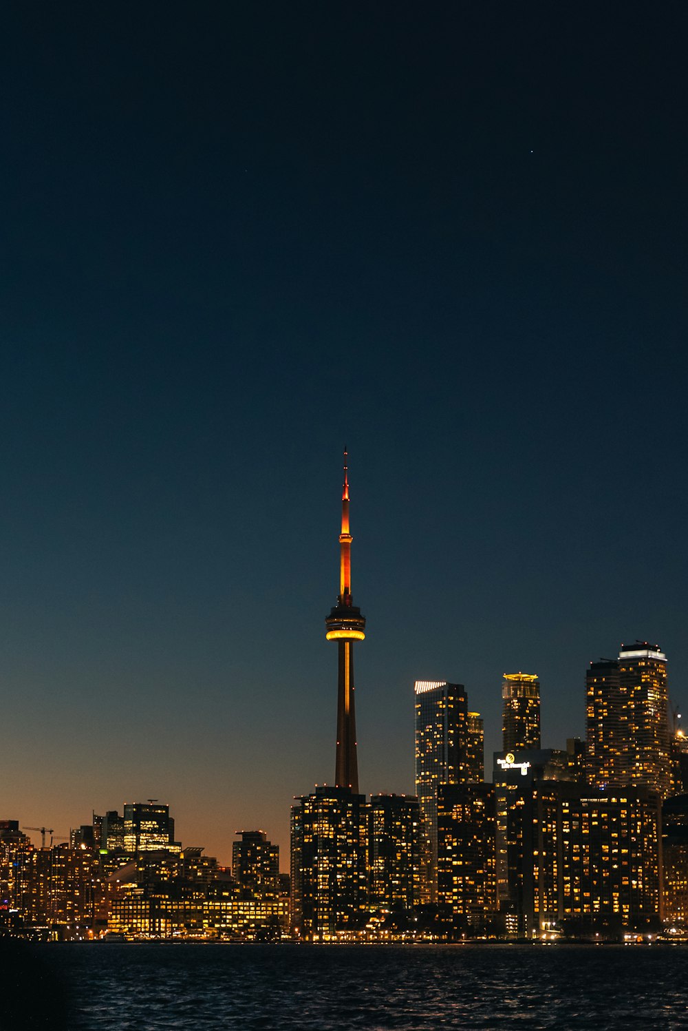 a view of a city at night from across the water