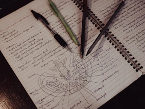 A medical student studying surgical anatomy on a tablet with digital notes.