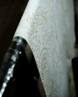 Close-up of wallpaper installation process highlighting professional craftsmanship