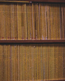 Vintage magazine covers arranged neatly on a digital archive shelf.