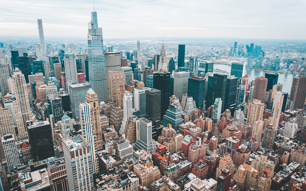 an aerial view of a city with tall buildings