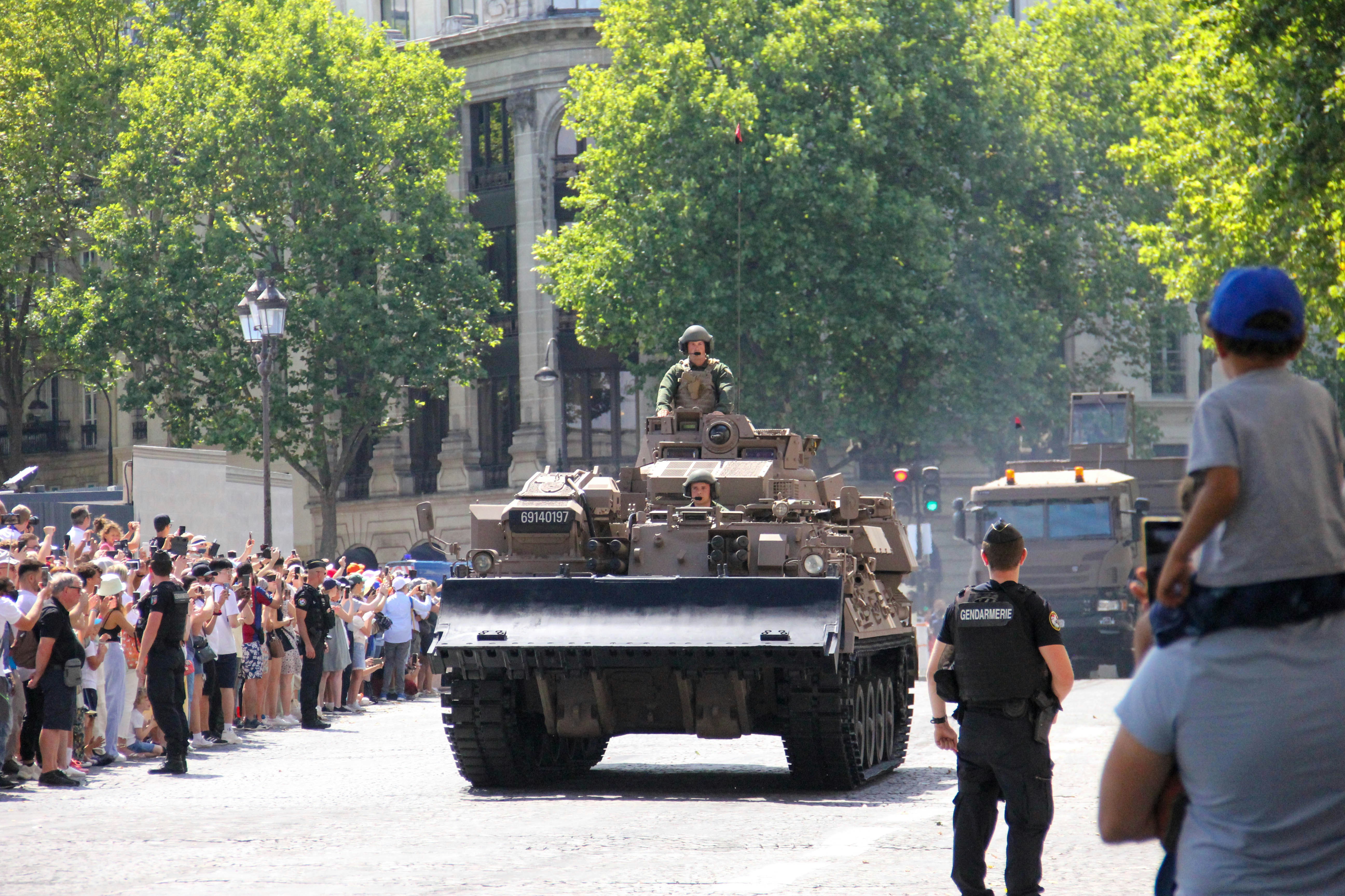 A French Army parade and an armored vehicle