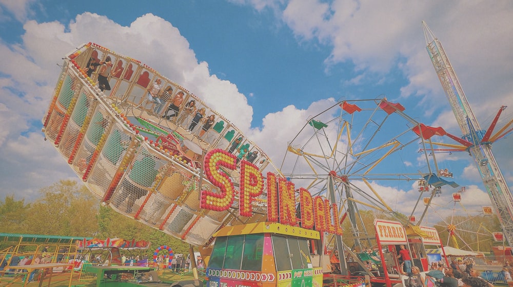 a carnival ride with people riding on it