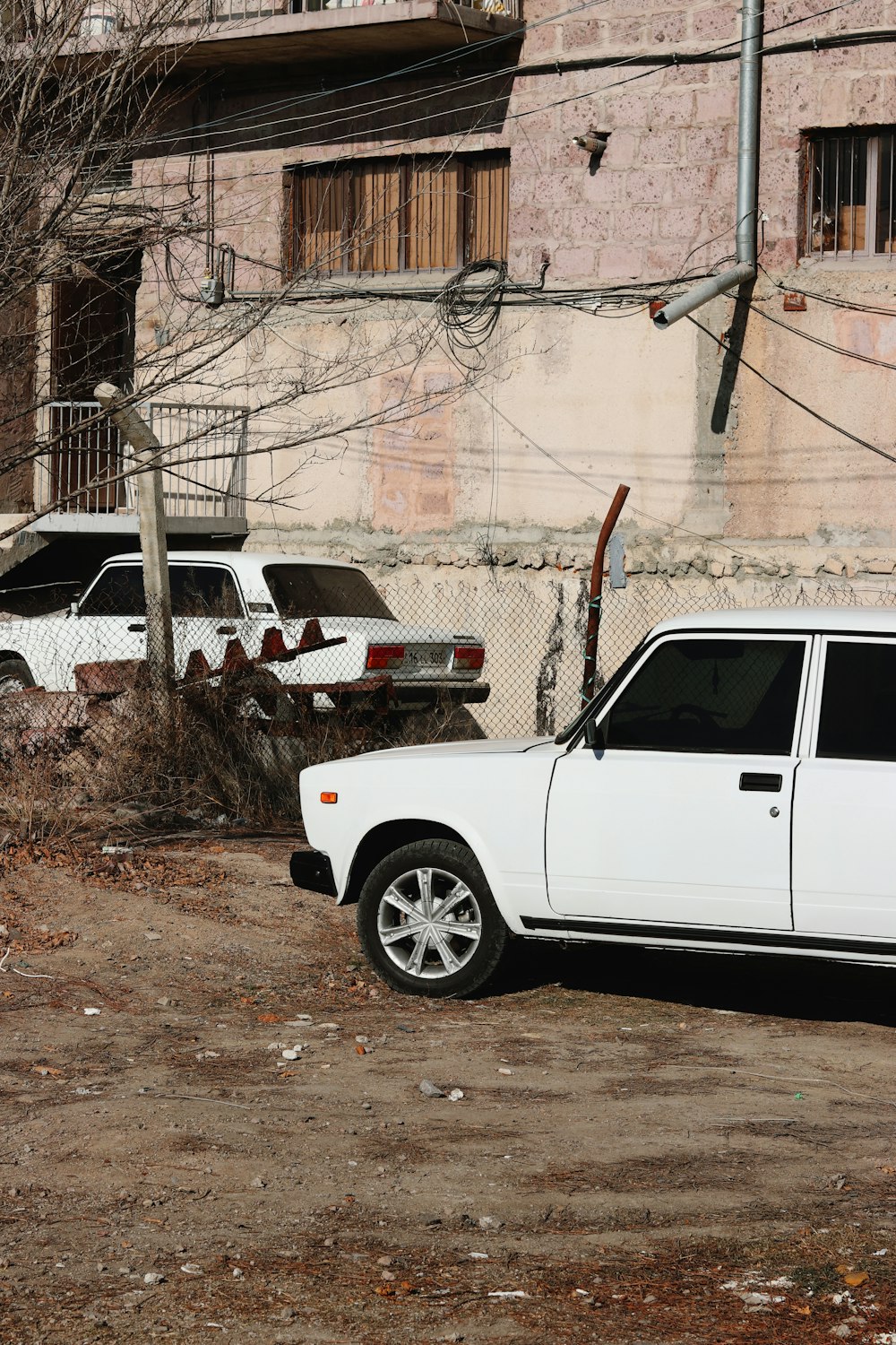 a white truck parked in front of a building