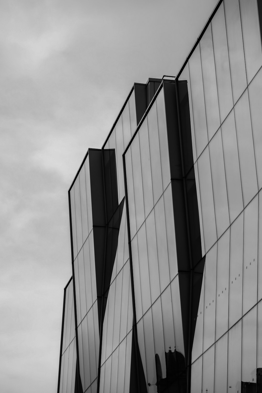 a black and white photo of the side of a building